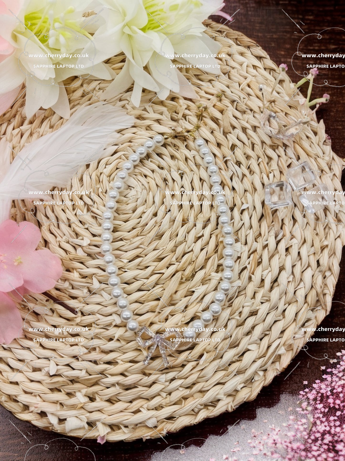 Rhinestone pearl necklace with a small diamond bow