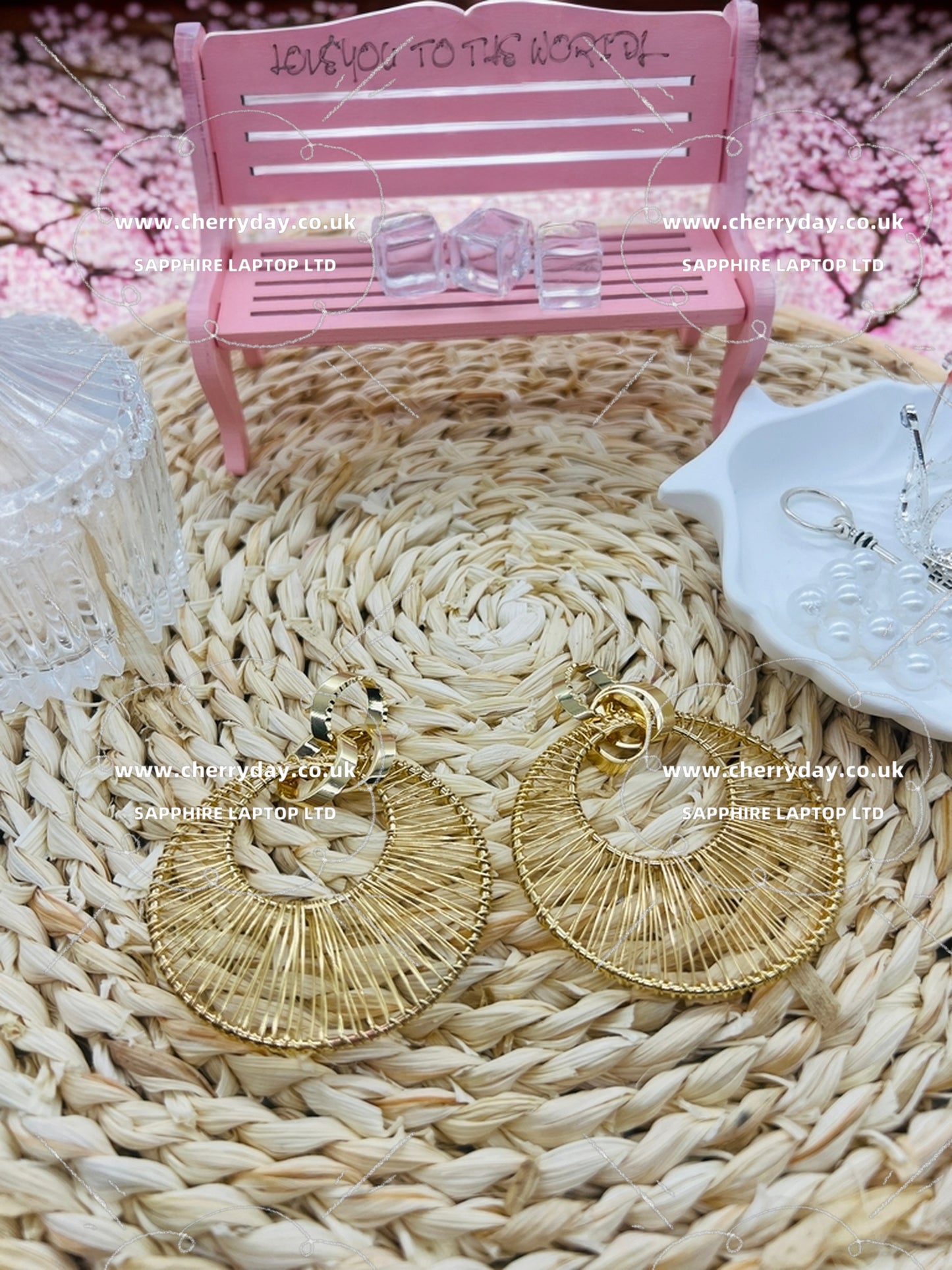 Gold metal sheet reel earrings