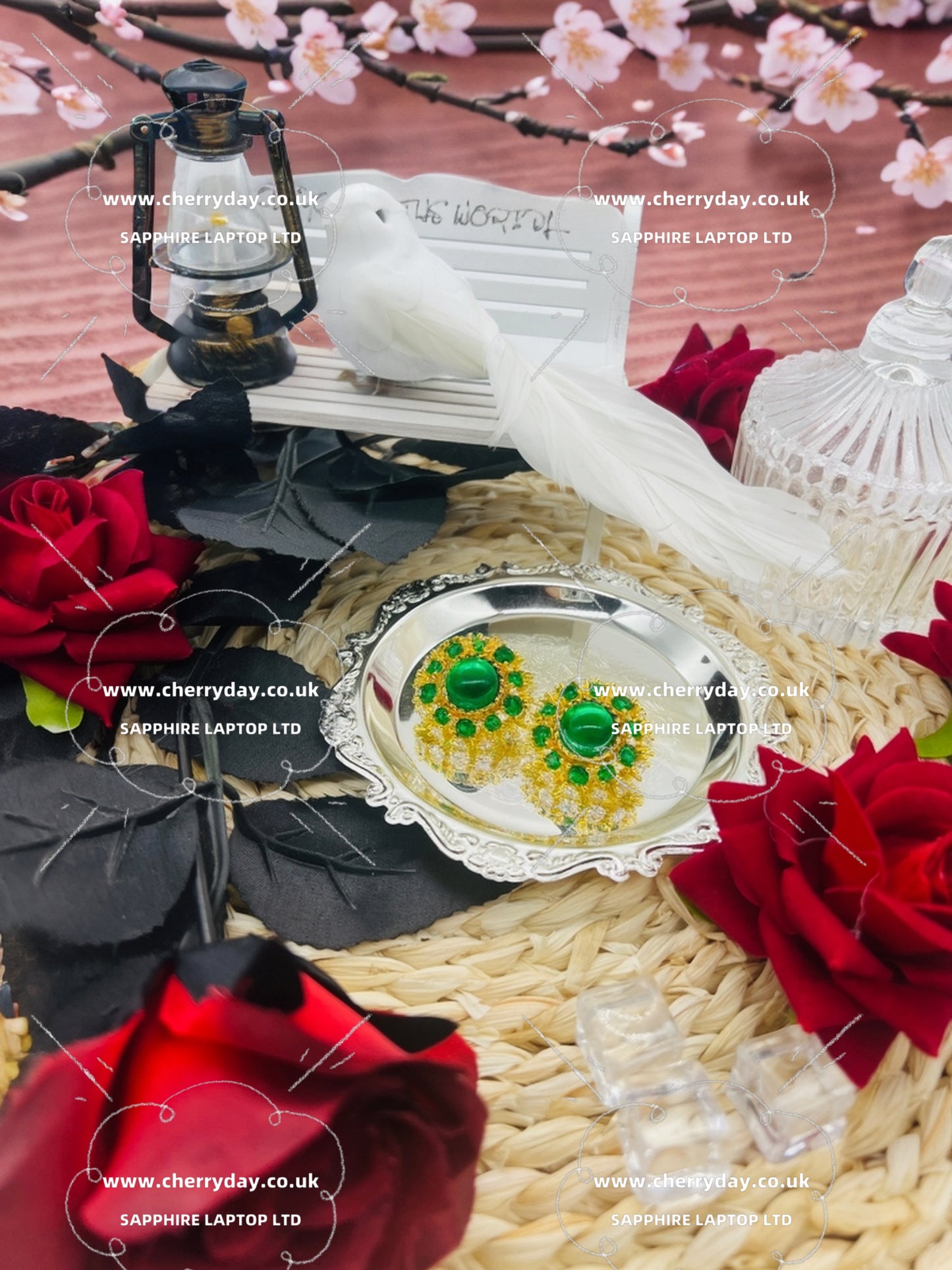 Emerald set openwork gold disc earrings