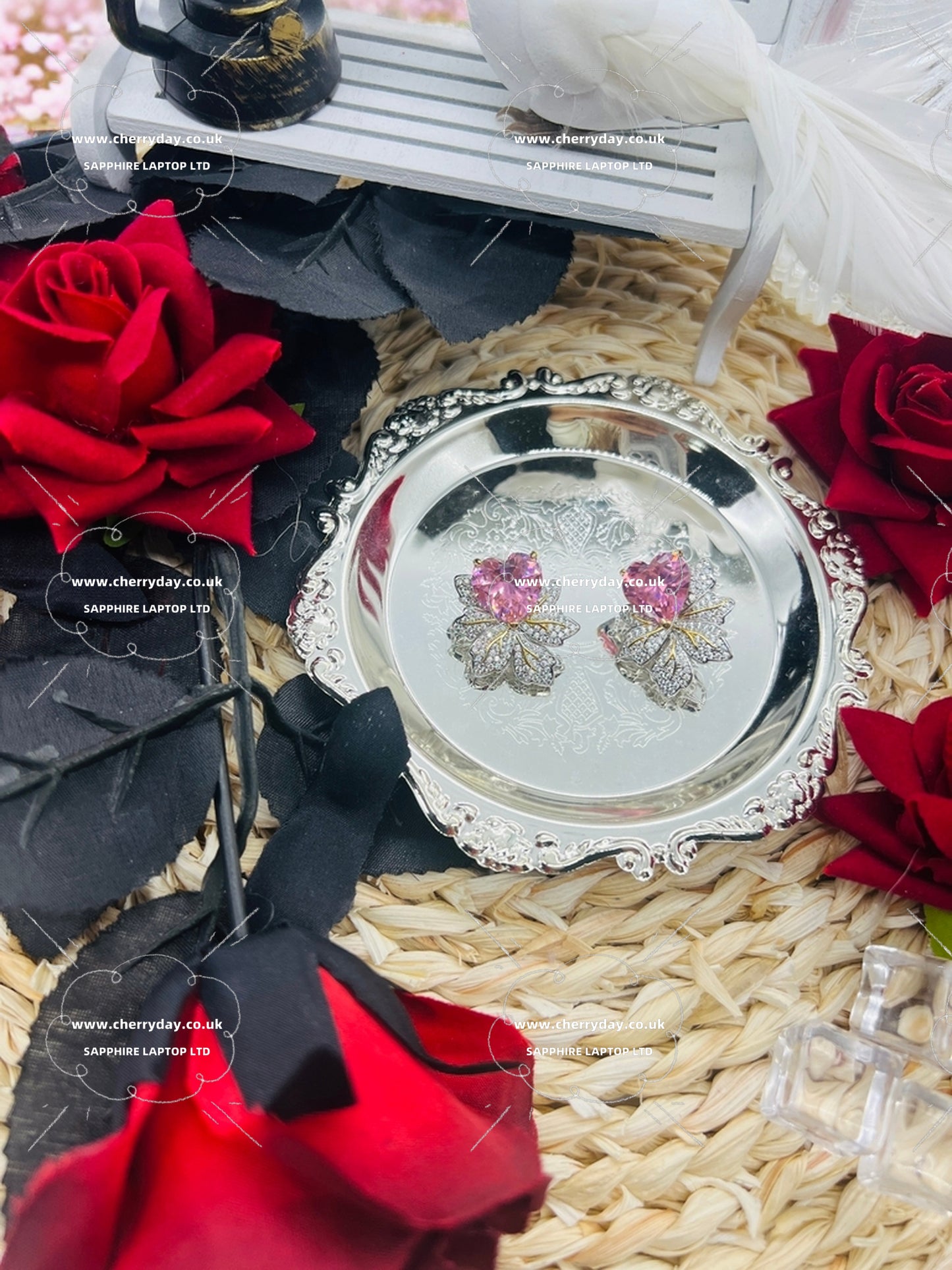 Pink butterfly spreading wings earrings