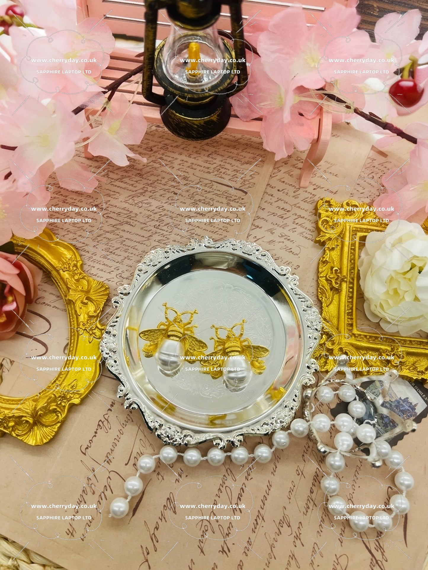 Gold bee pearl earrings