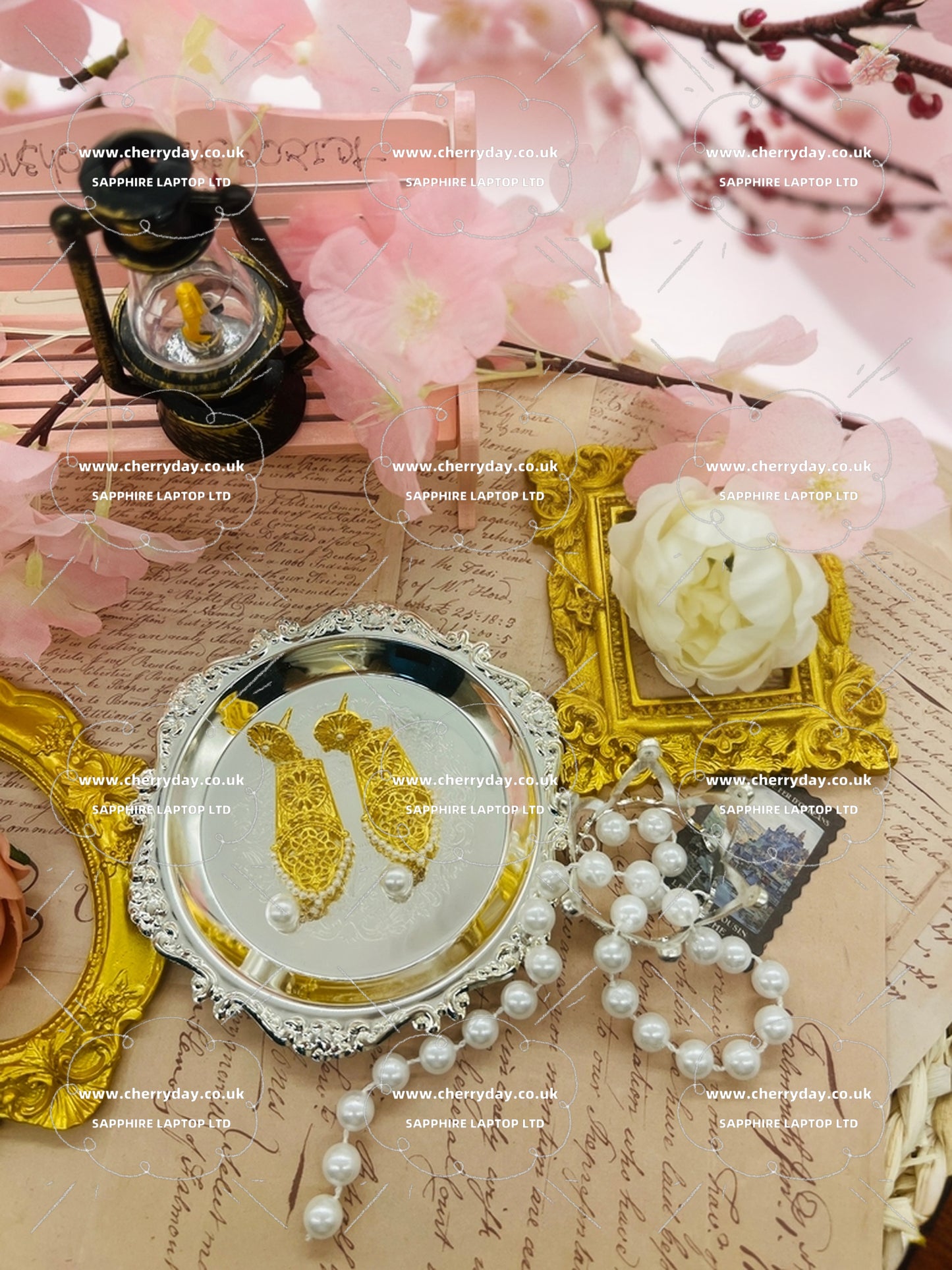 Gold shield earrings