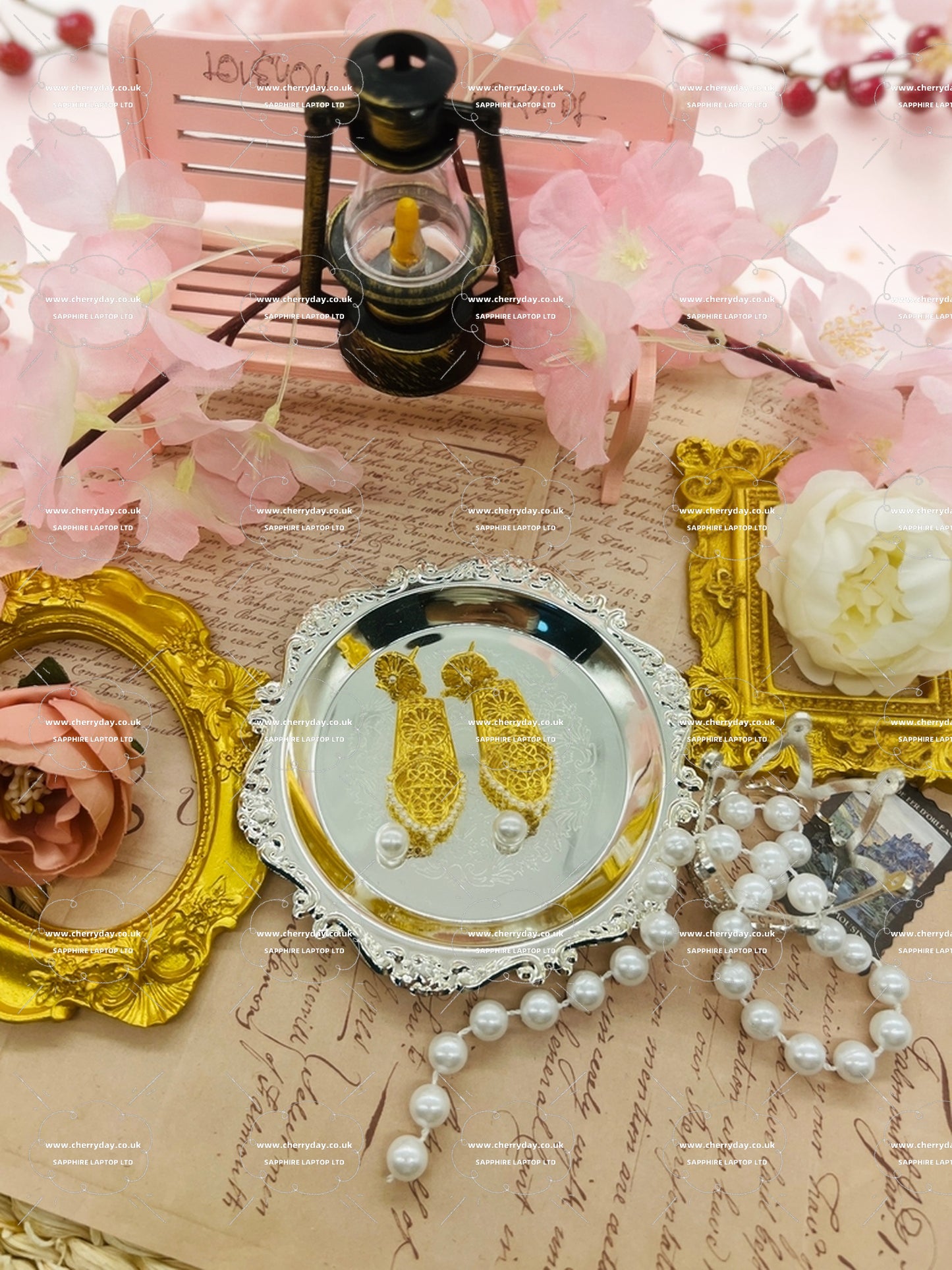 Gold shield earrings