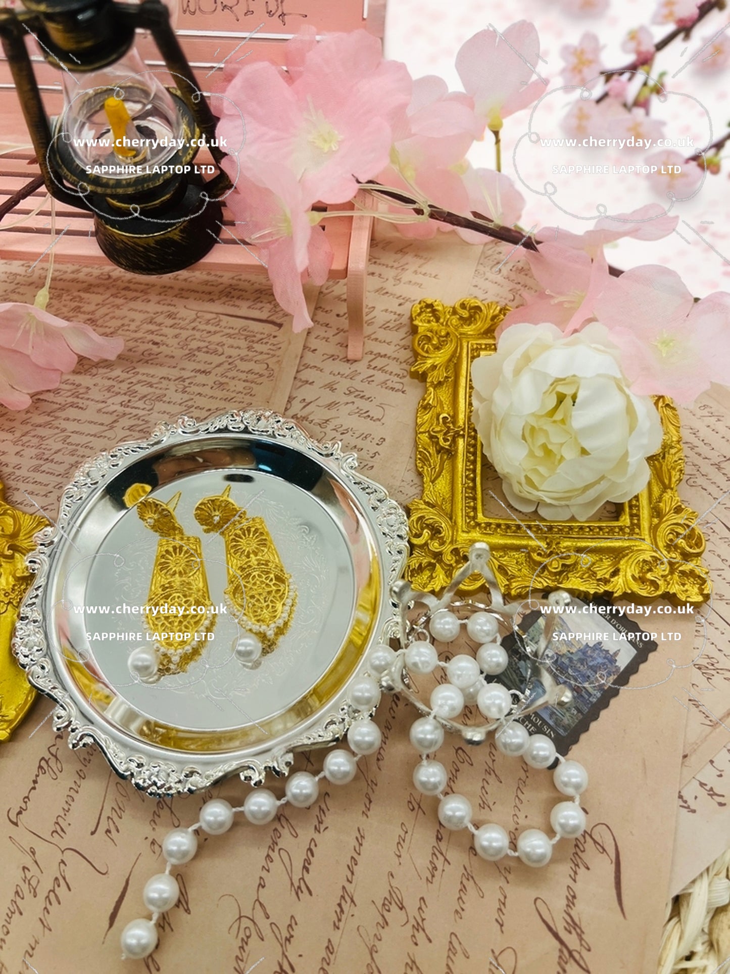 Gold shield earrings