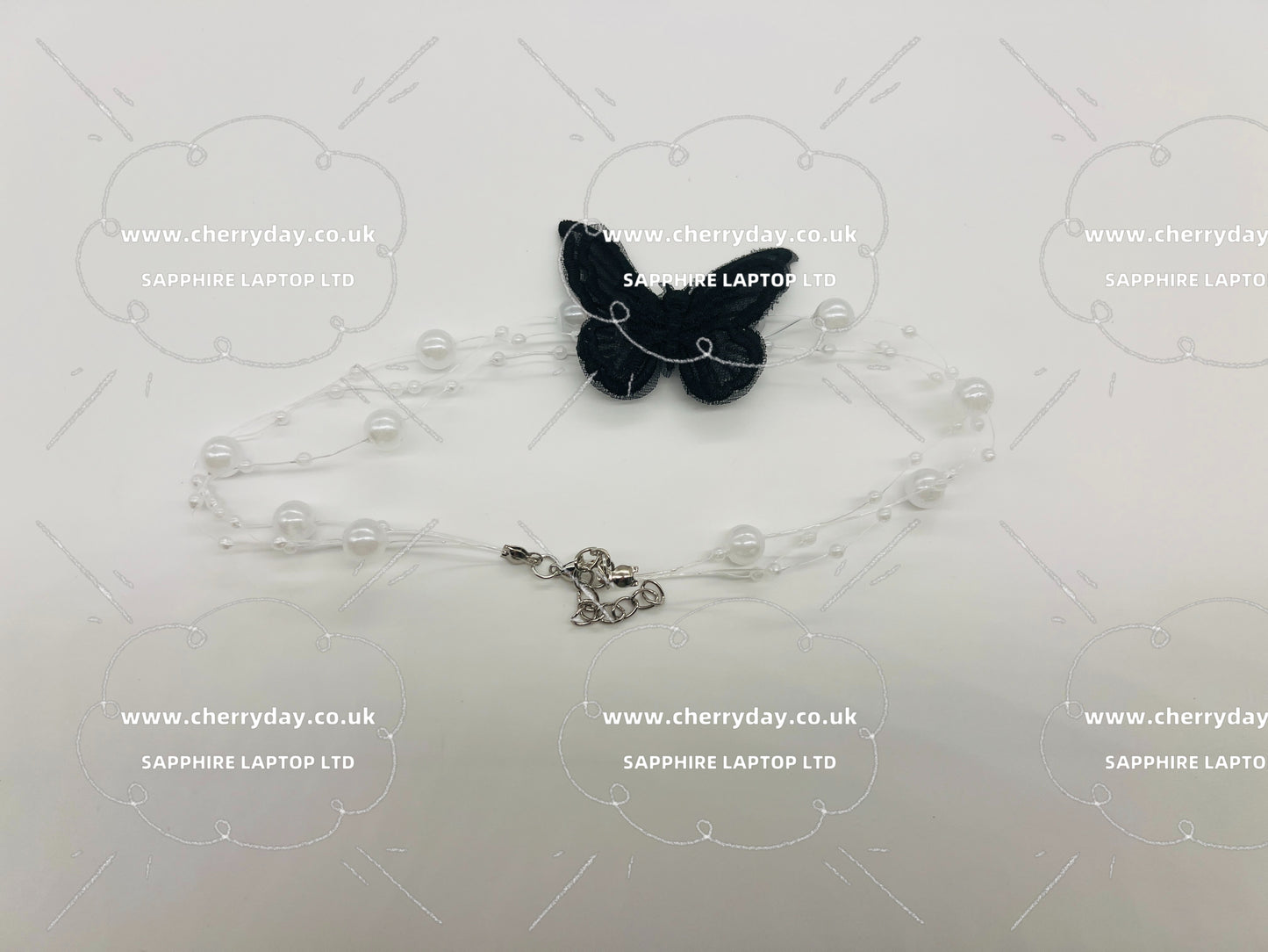 Butterfly pearl string necklace