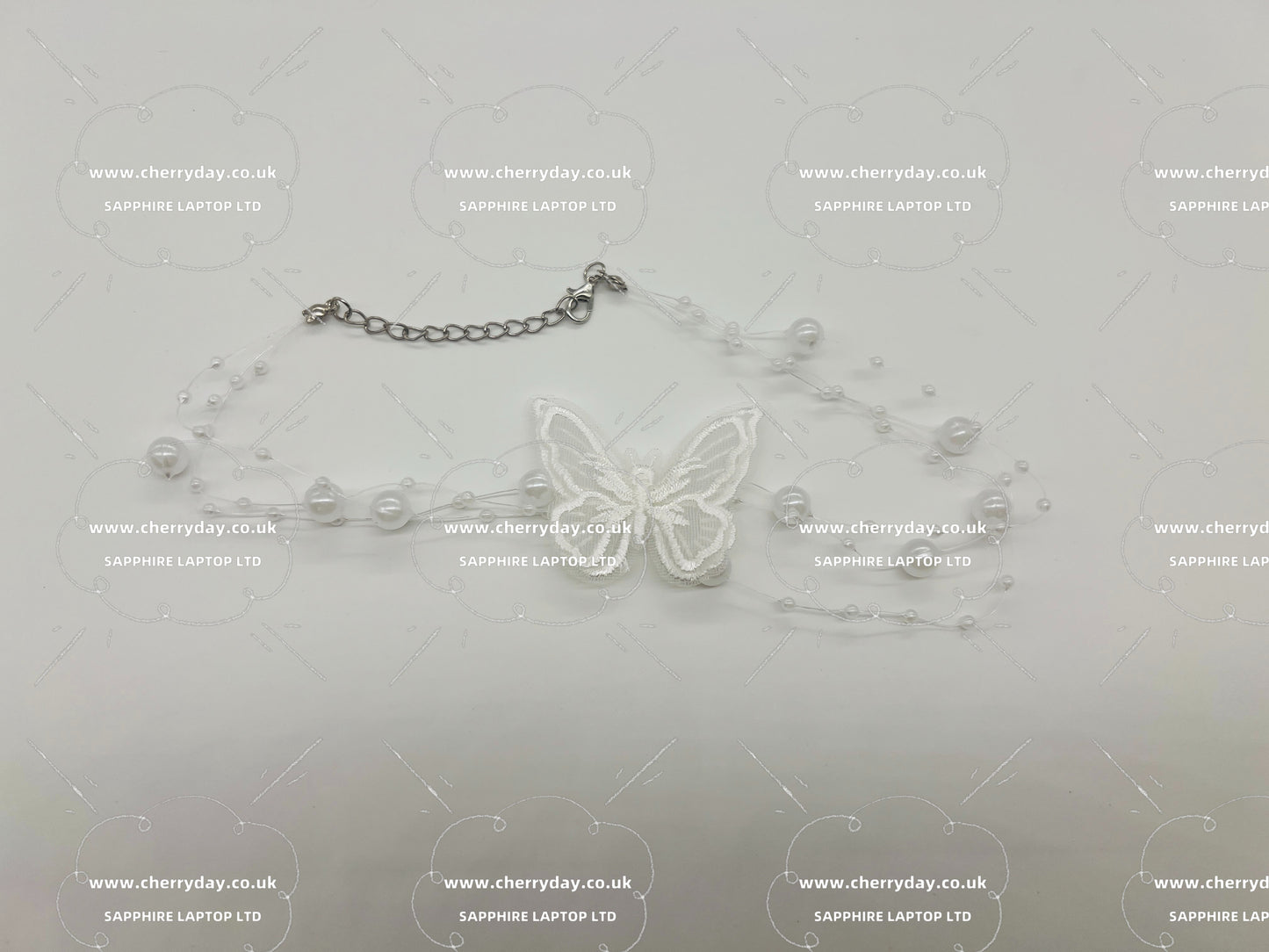Butterfly pearl string necklace