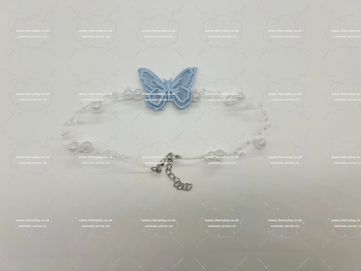 Butterfly pearl string necklace