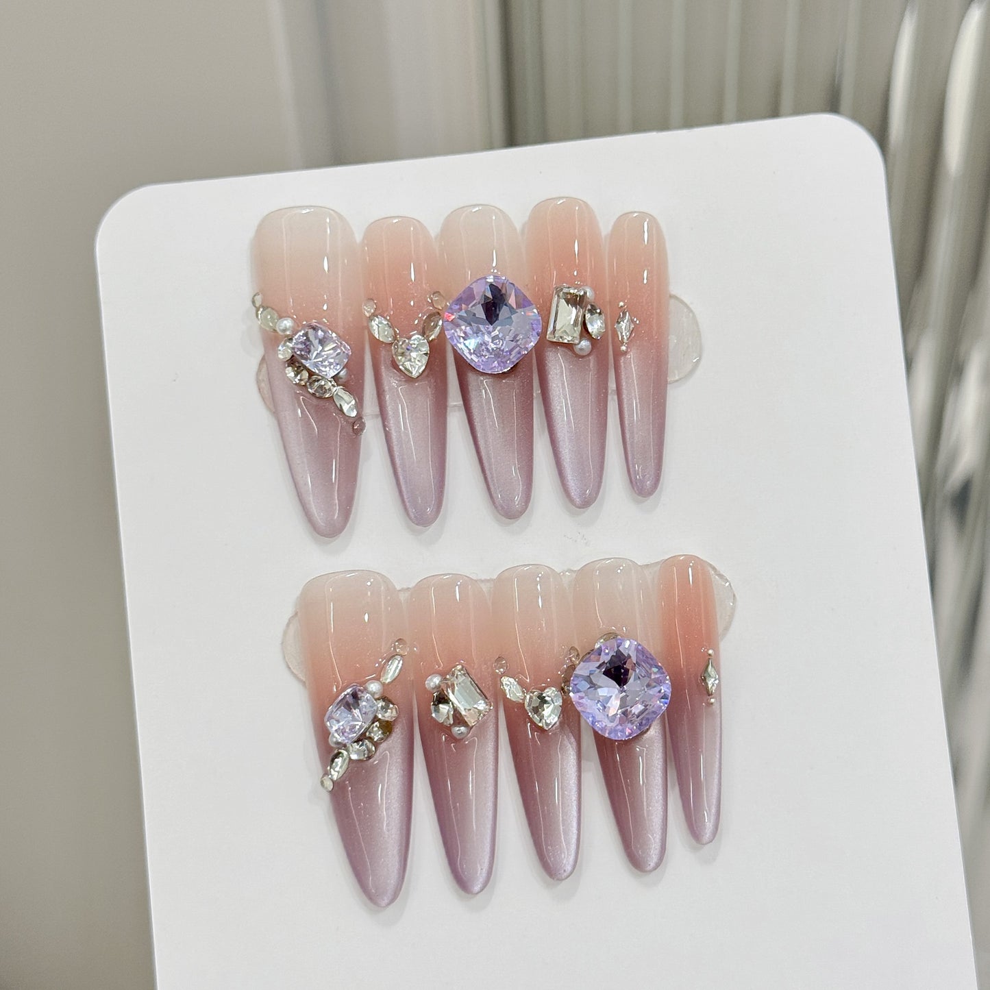 Nails 020-Nail art with purple beveled edges and diamonds